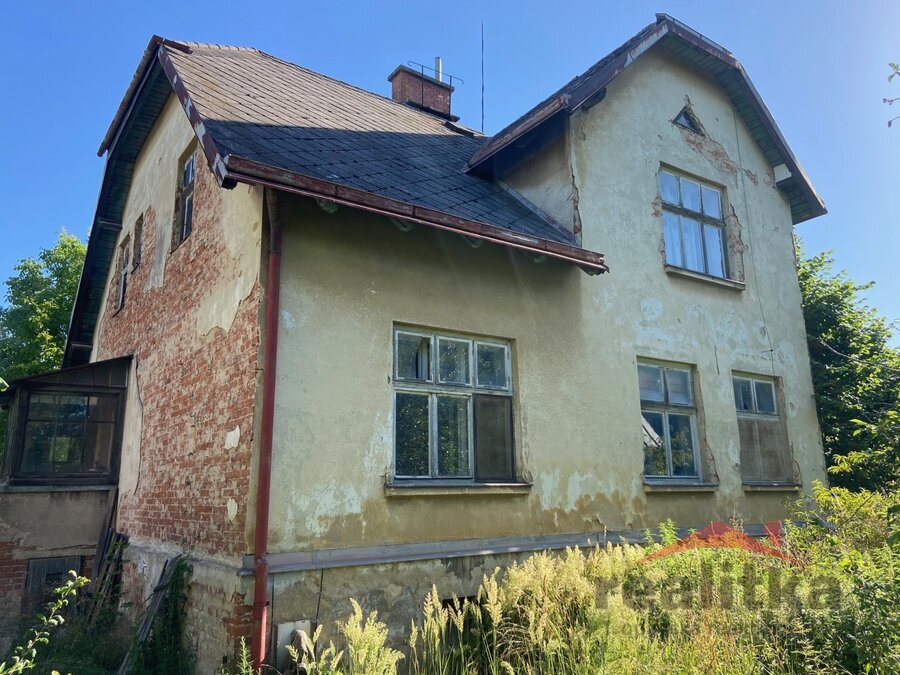 Prodej rodinného domu se samostatnou garáži a zahradou Potoční ul., Opava-Komárov